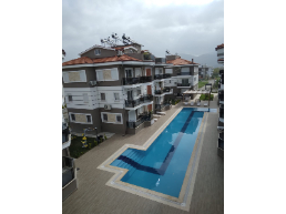 3+1 apartment for sale in a complex with pool in dalaman